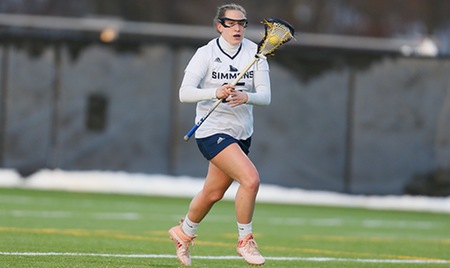 NASHUA, N.H. --Sophomore midfielderMolly Reinhold (Mystic, Conn.)(six) andsenior midfielderMallory Cottam (Hope, R.I.)(five) combined to net 11 goals to lead the Simmons University women's lacrosse team to a 23-12 victory over host Rivier University this afternoon in a Great Northeast Athletic Conference match at Raider Field in Nashua, N.H. The Sharks improve to 6-6 overall, including 4-4 in league play, while the Raiders fall to 3-9 and 2-6.