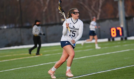 DARTMOUTH, Mass.-- Sophomore midfielderMolly Reinhold (Mystic, Conn.) tallied five points, including four goals, to lead the Simmons University women's lacrosse team in an 11-9 loss to host University of Massachusetts Dartmouth this evening at Cressy Field in Dartmouth, Mass. The Sharks fall to 5-5 on the season, while the Corsairs improve to 4-5.